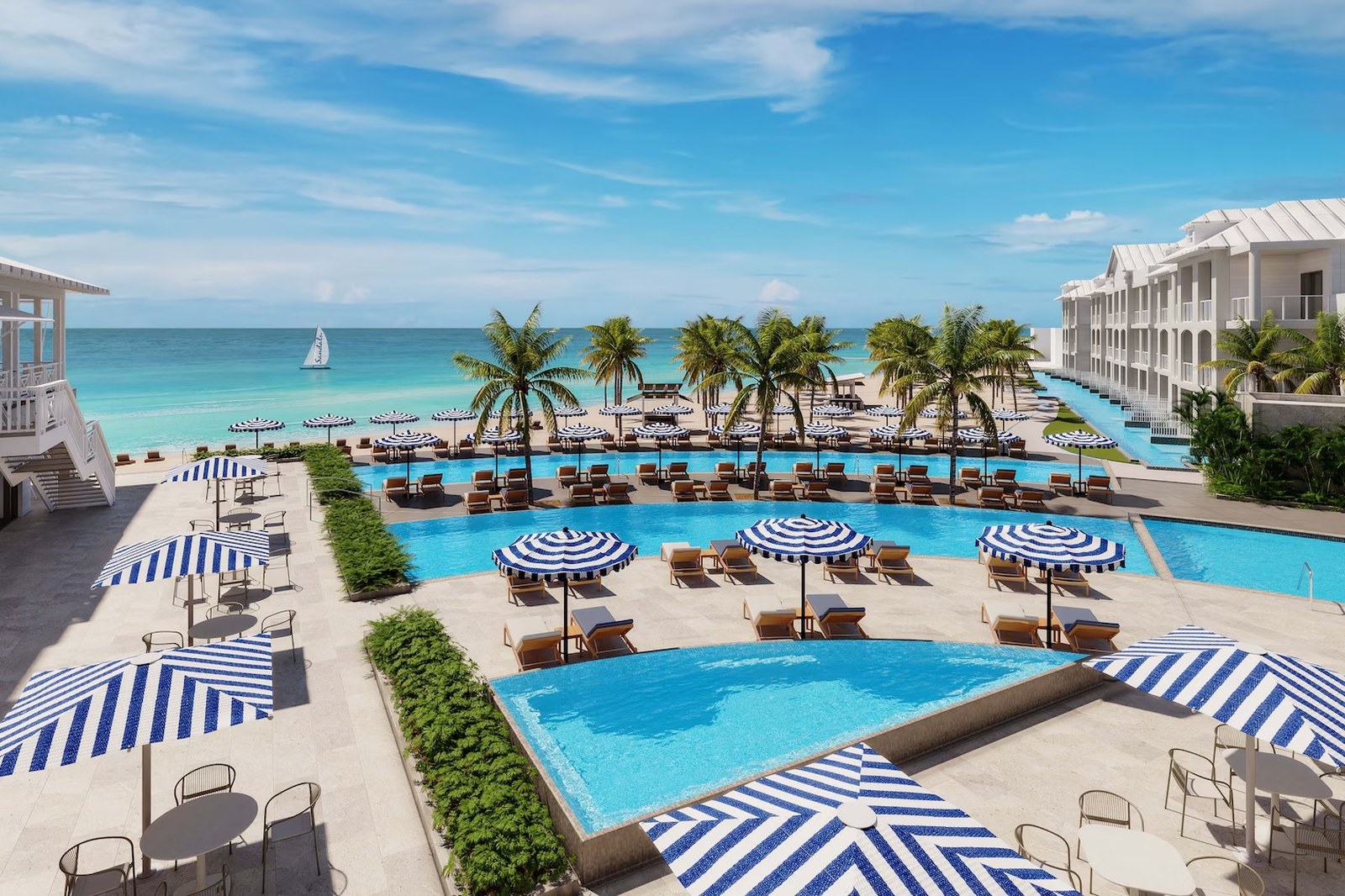 Sandals all-inclusive Caribbean resort with pools overlooking the turquoise ocean